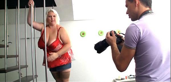  Big blonde woman gets fucked from behind after photosession